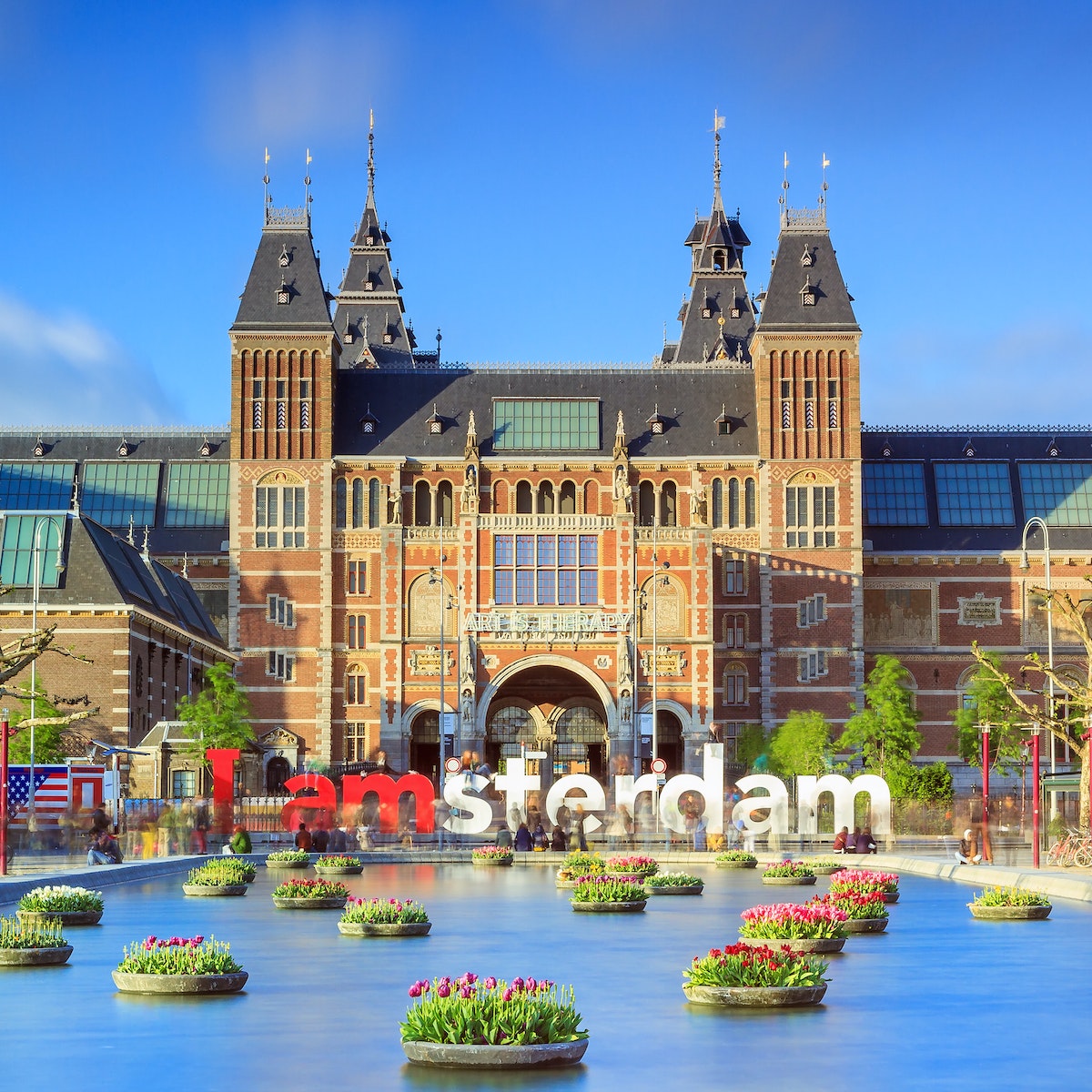 Rijksmuseum with tulips in Amsterdam..NOTE: dated image - "iamamsterdam" sign has been removed from outside museum.