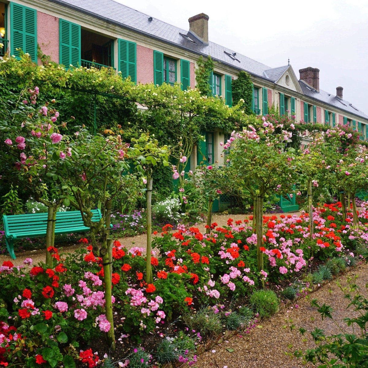 GIVERNY, FRANCE -3 JULY 2016- The house of French impressionist painter Claude Monet in Giverny is now a museum. It includes a beautiful garden with a nymphea waterlily pond and Japanese bridge.; Shutterstock ID 649707625; Your name (First / Last): Daniel Fahey; GL account no.: 65050; Netsuite department name: Online Editorial; Full Product or Project name including edition: Maison et Jardins de Claude Monet POI