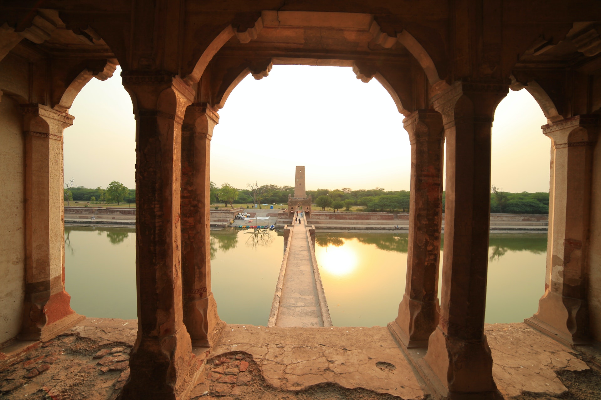 A view across the water from the pavilion in Hiran Minar, Pakistan